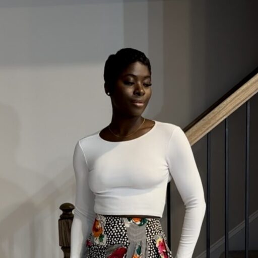 An image of the author looking confident and content